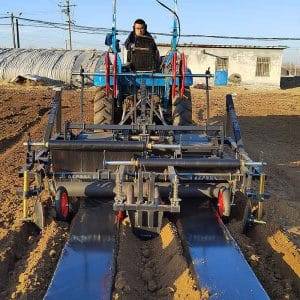 Ridging and film covering machine