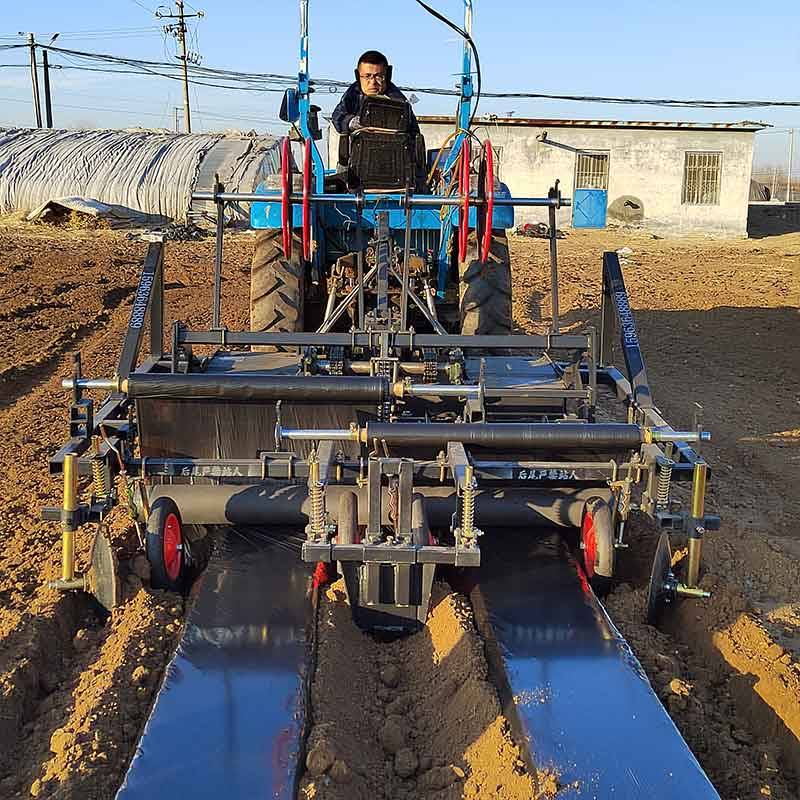 Ridging and film covering machine